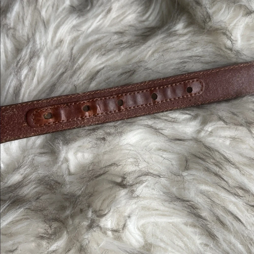 Nocona brown leather belt and ornate silver belt buckle